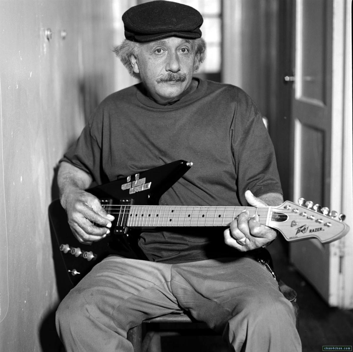 Albert Einstein playing electric guitar